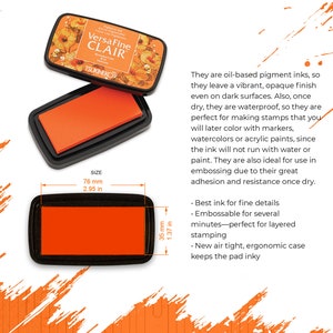 May include: Orange VersaFine Clair ink pad with a floral design on the lid. The ink pad is 2.95 inches wide and 1.37 inches tall. The text "VersaFine Clair" is printed on the lid. The text "TSUKINEKO" is printed below the name of the ink pad.