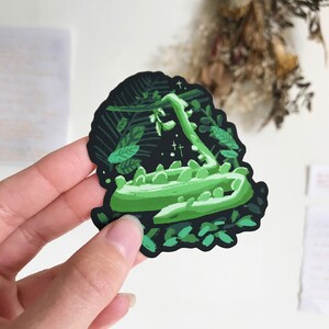 Green Little Dragon Sticker | Sleepy Dragon | Dragon Art Matte Sticker | Black Background Sticker | Fantasy Sticker | Vinyl Weatherproof