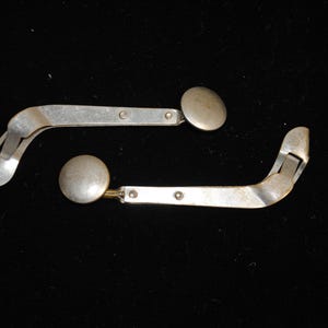 Ajusteurs de boutons de manchette antiques Pat. Jeu d'argent frauduleux par un joueur le 16 août 1887