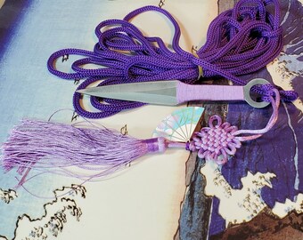 Sheng Biao, Rope Dart with Sheath. 4 meter Purple Rope with a Steel Kunai Dart. Matching Lavender Wrap, Lucky Knot Tassel Tail, and Wood Fan