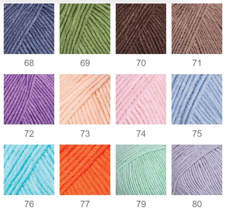 May include: A collection of 12 yarn skeins in various colors, including blue, green, brown, purple, pink, orange, and light blue. Each skein is labeled with a number from 68 to 80.