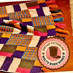 May include: A vibrant, woven textile featuring a patchwork design in purple, orange, blue, pink, and white. The edges are finished with tassels in various colours. The image includes a circular logo with the text "VINTAGE PATTERN PDF" and "WALT'S WARM WORKS".