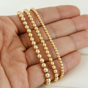 Pulsera de cuentas chapada en oro de 14 k resistente al deslustre, con capas, cuentas chapadas en oro, pulseras apilables, delicada pulsera de bolas de oro imagen 5
