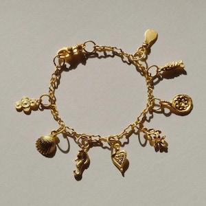 Matte Gold Charm Bracelet, Flower, Fish, Shell Charms