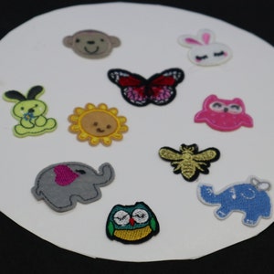 Set of  10pcs  bulk lot small   mixed cartoon animal bunny elephant  bee butterfly embroidered     iron on patch  about   3-4cm
