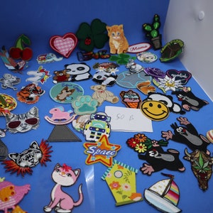 Bundle of  50pcs wholesale bulk lot mixed   rare  cartoon collection  embroidered   iron  on patch  diy   5-8cm