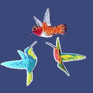 May include: Three embroidered hummingbird patches. One is orange and red, one is blue and green, and one is yellow and red.