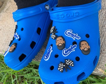 blue crocs with charms