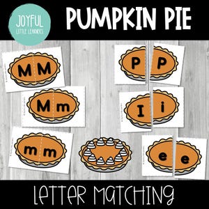 Peut inclure: Jeu éducatif de correspondance de lettres sur le thème de la tarte à la citrouille. Les cartes sont orange et marron, avec des lettres comme "M", "P", "I" et "E". Les mots "Pumpkin Pie" et "Letter Matching" sont également visibles.