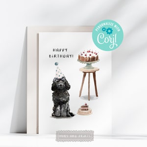 May include: A birthday card featuring a black dog wearing a blue and white party hat. The card says "Happy Birthday!" and has a cake with cherries on top. The card is personalized with the name "Cory".