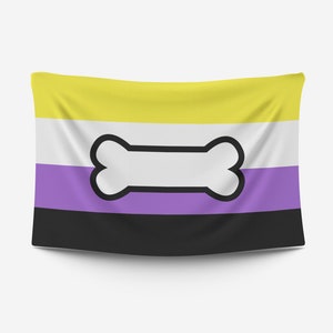 May include: A yellow, purple and black flag with a white bone-shaped symbol in the centre. The flag is made of fabric and is hanging from a pole.