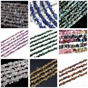 May include: Nine strands of gemstone chip beads in various colors, including blue, green, purple, and clear. The chips are irregular in shape and size, strung together to create a textured appearance. The beads are displayed against a black and white background.