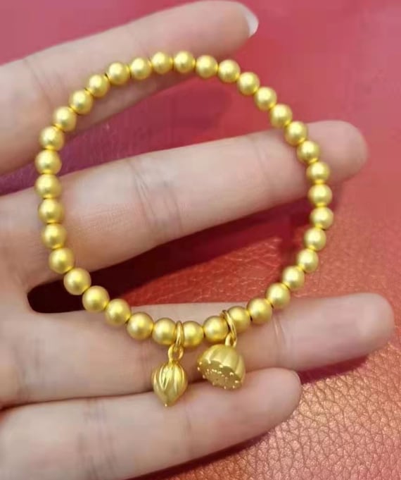 24k gold charm sale bracelet