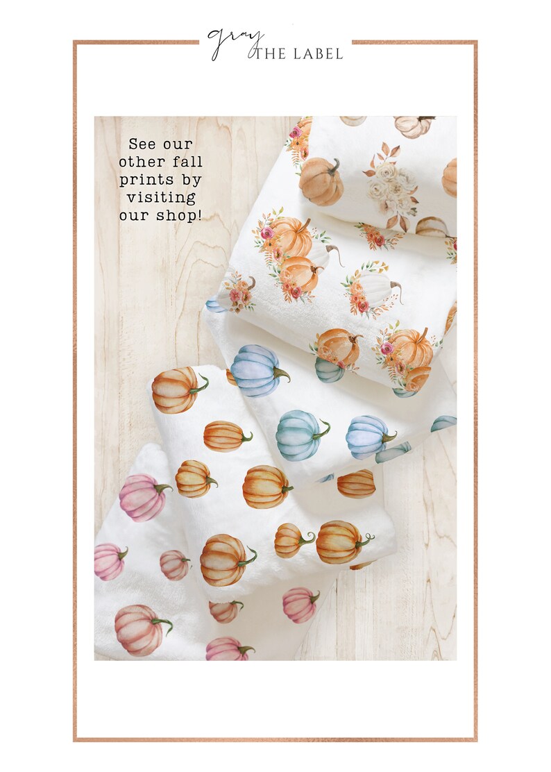 May include: White fabric with watercolor pumpkin patterns in orange, pink, and blue. Some pumpkins are adorned with floral arrangements. The text "See our other fall prints by visiting our shop!" is visible.