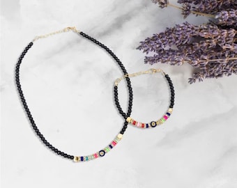 Handmade Black Beaded Evil Eye Jewelry Set: Adjustable Bracelet & Necklace