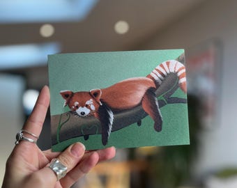 Tarjeta de felicitación con panda rojo