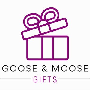 May include: A purple line art illustration of an open gift box with a bow on top. Below the gift box is the text "GOOSE & MOOSE GIFTS" in black, with "GIFTS" in purple.