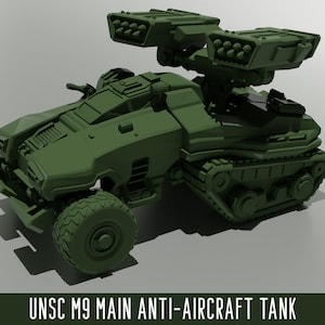 May include: A green UNSC M9 Main Anti-Aircraft Tank model. The tank features a tracked base, large wheels, and multiple missile launchers. The text "UNSC M9 MAIN ANTI-AIRCRAFT TANK" is displayed at the bottom of the image.
