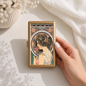 vintage women's cigarette case Style Smoking Woman with Built in Lighter Metal Wallet bottom tapers to 2.5 inches wide Snap closure main compartment with 1 zip exterior pocket and 1 slip exterior pocket Interior has nylon lining This is a great way to keep your cigarettes and lighter together at all times Vintage Cigarette Case Purse Accessory