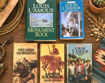 5 pc Lot LOUIS L'AMOUR Western Books: Monument Rock 1998 First Edition HC, Ride the River, Sackett Brand, Broken Gn, Silver Canyon. Rustic.