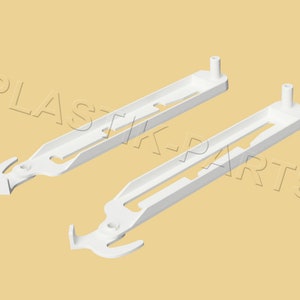 May include: Two white plastic shelf brackets with a hook on one end and a small peg on the other end.