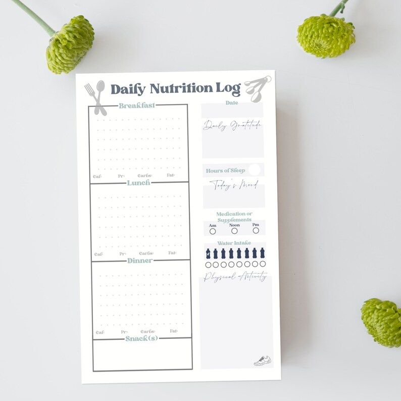 May include: A printable daily nutrition log with sections for breakfast, lunch, dinner, snacks, daily gratitude, hours of sleep, today's mood, medication or supplements, water intake, and physical activity.
