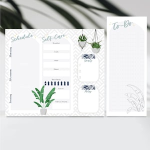 May include: A white and gray planner with sections for scheduling, self-care, and to-do lists. The planner includes text labels such as "Schedule", "Self-Care", and "To-Do". Decorative elements include potted plants and a geometric pattern.