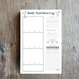 May include: A printable daily nutrition log with sections for breakfast, lunch, dinner, snacks, daily gratitude, hours of sleep, today's mood, medication or supplements, water intake, and physical activity.