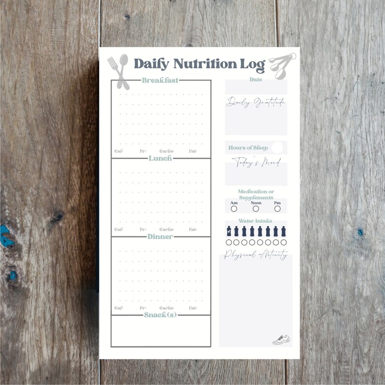 May include: A printable daily nutrition log with sections for breakfast, lunch, dinner, snacks, daily gratitude, hours of sleep, today's mood, medication or supplements, water intake, and physical activity.