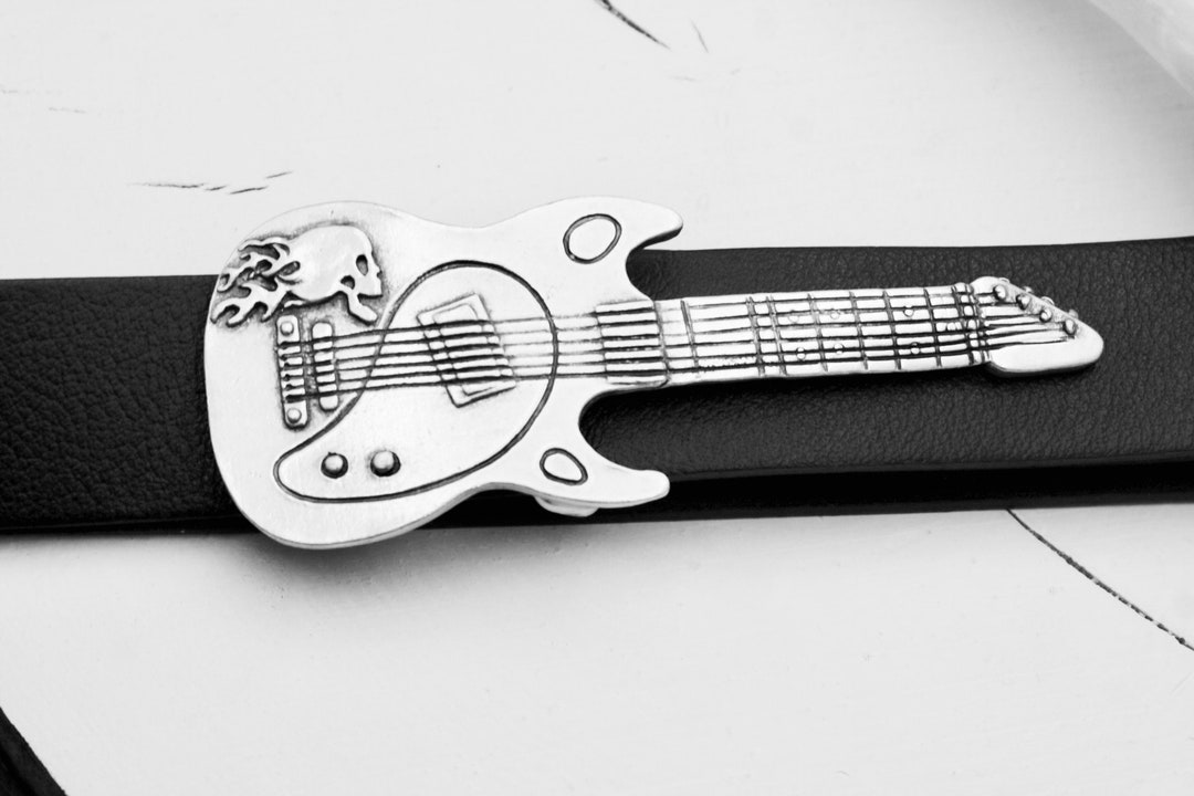 designer belt with guitar buckle