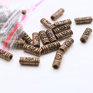 Antique Bronze Tube Beads: Patterned Metal Spacers (50 Pcs)