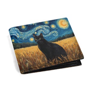 May include: A bi-fold wallet featuring a black cat in a wheat field under a starry night sky, reminiscent of Van Gogh's style. The wallet is black with a printed design and has a classic rectangular shape.