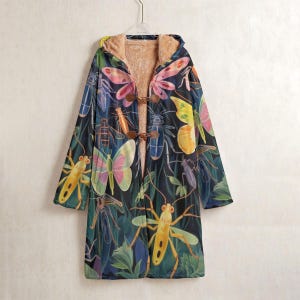 May include: A long, hooded coat with a dark background and a colorful insect and butterfly pattern. The coat features toggle closures and a soft, tan-colored lining. The design includes yellow, pink, and blue insects and butterflies.
