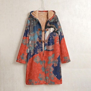 May include: A long, hooded coat with a Japanese-inspired design. The coat features a woman in a kimono, floral patterns, and toggle closures. The coat's colour palette includes red, blue, and green hues, with a soft, tan-coloured lining.