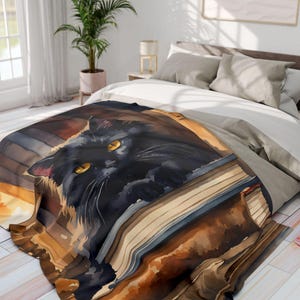 May include: A black cat with yellow eyes peeks out from a stack of old books. The cat is lying on its side, with its paws resting on the top book. The books are stacked in a pile, and the top book is open. The background is a blurry image of a bed with pillows.