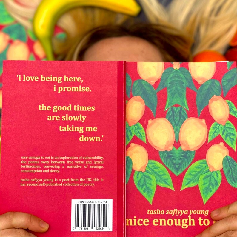 May include: A red book with the title "nice enough to eat" by tasha safiyya young. The cover features a lemon pattern and the text "'i love being here, i promise. the good times are slowly taking me down.'"