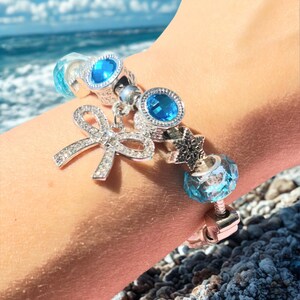 1 pezzo Nuovo braccialetto da donna con catena di perline, lettera e fiocco in argento | SHEIN ALIA