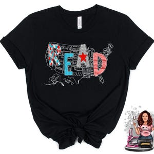 May include: Black t-shirt with a graphic of the United States map with the word "READ" spelled out in red, white, and blue. The states are outlined in white and the state names are written in black.