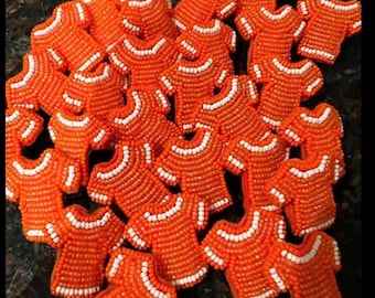 Pin de camisa naranja con cuentas, Verdad y Reconciliación