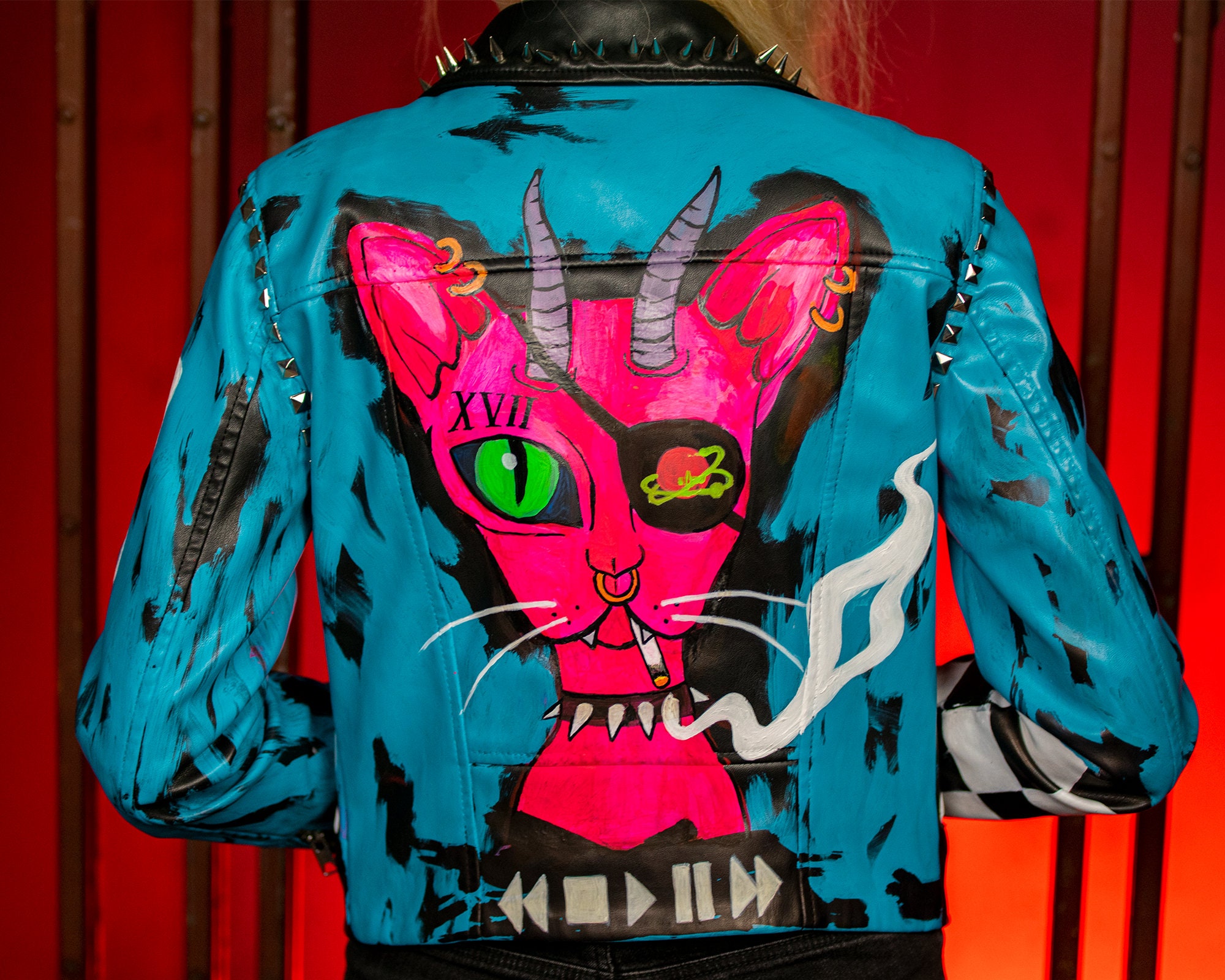 turquoise moto jacket