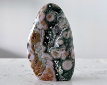 Adorable 8th Vein Orbicular Ocean Jasper Fish Carving With Green