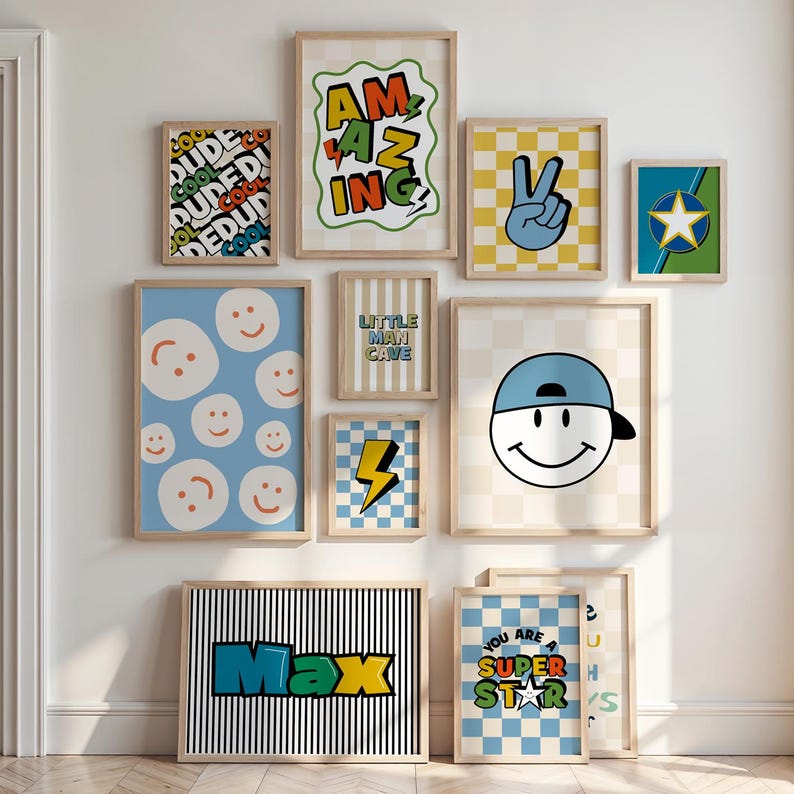 May include: A collection of framed art prints with a playful, retro theme. Designs include smiley faces, lightning bolts, and the words "Amazing" and "Max." The color palette features blues, yellows, and greens, with a checkerboard and striped background.