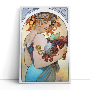 May include: A canvas print depicting a woman with a basket of fruit, in the Art Nouveau style. The woman has floral hair and a blue dress. The artwork uses a soft colour palette with gold accents and a decorative border. The artist's signature is visible.