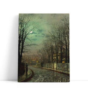 May include: A canvas print of a moonlit street scene. The artwork shows a cobblestone road with figures walking, lined by bare trees and a stone wall. The sky is a mix of teal and grey, with a full moon visible.