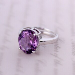 dainty amethyst ring. Stackable rings. Birthstone ring. PurpleRing. jewelry ring. Gemstone ring. oval faceted ring. pave ring.
