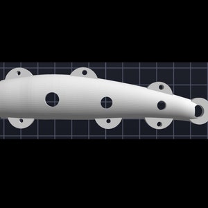 May include: White plastic part with a curved shape and five holes. The part has a smooth surface and is designed for mounting.