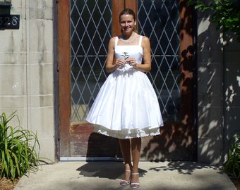 Katherine Grey's Wedding Dress ~ Square neckline in Dupioni Silk with pockets an extra-full gathered skirt and petticoat