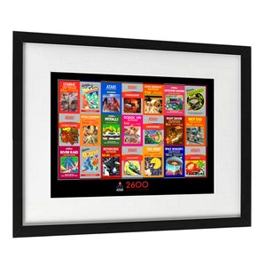 Póster de Atari 2600 de 21 portadas, tamaño A3 (42,7 x 30,5 cm). Títulos clásicos retro como Pac-Man, Space Invaders, Defender, Breakout y Missile Com.
