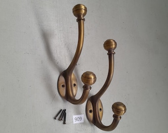 2 vintage style GIANT sold brass coat hooks in a aged finish 1lb of solid brass each made to last includes FREE matching solid brass screws
