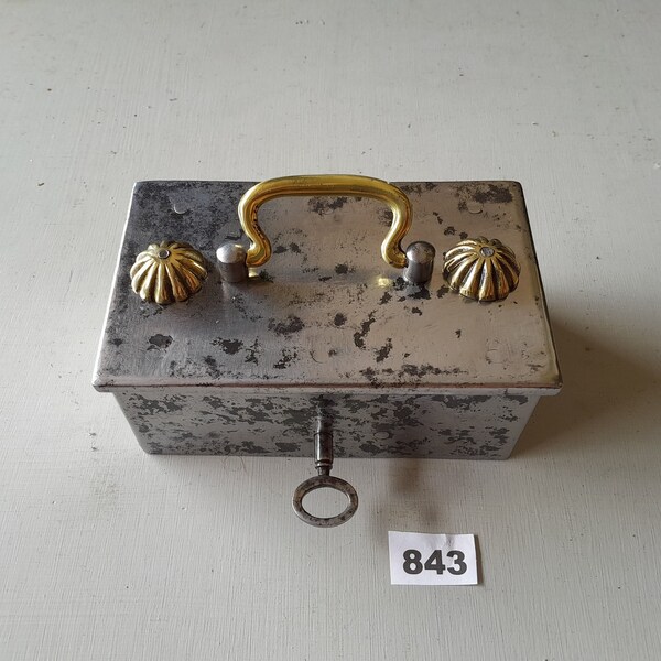 Vintage small heavy steel cash box in working condition with 2 solid brass beehive buttons & a brass folding handle early 1900s